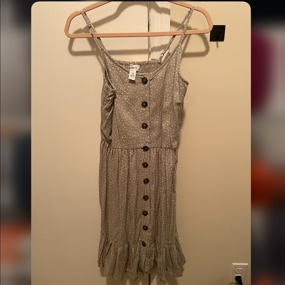 Green dress with white dots